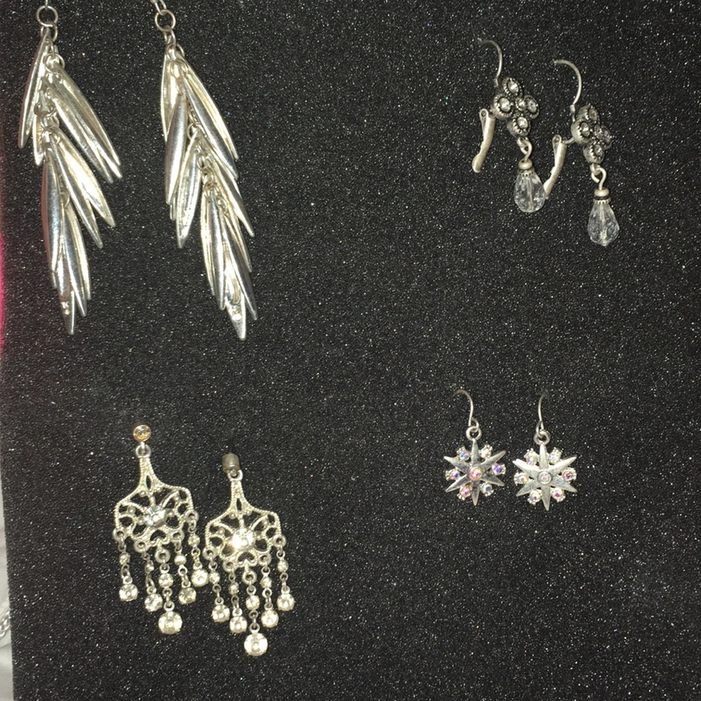 4 pairs of Silver earrings